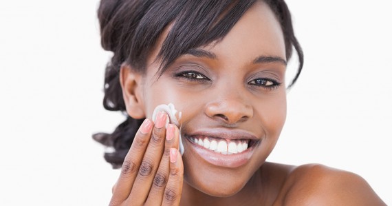 Woman using skin cream